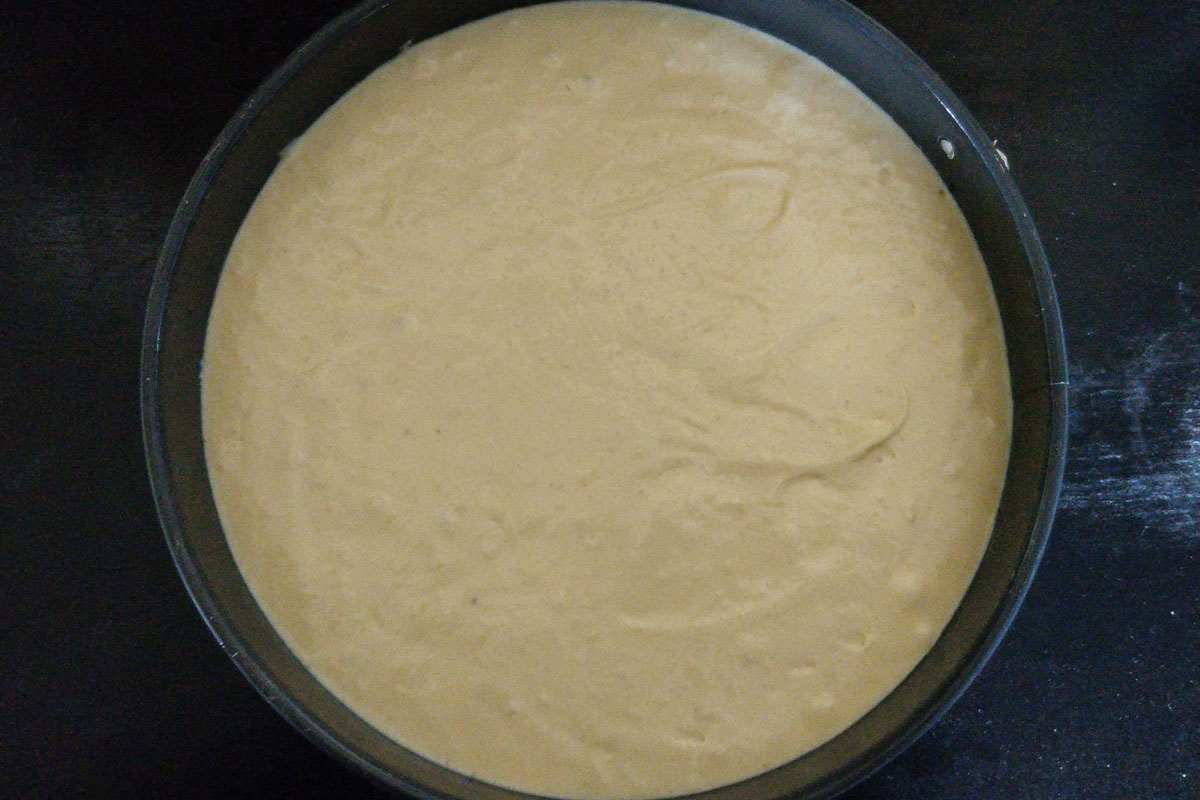Cake mold with the batter in it
